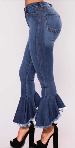 blue jeans with ruffles on the bottom